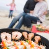 Couple Cooking on a Barbecue