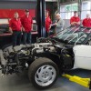 GM technicians work to restore the badly damaged 1992 C4 Corvette convertible