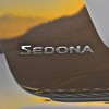 2015 Kia Sedona badge