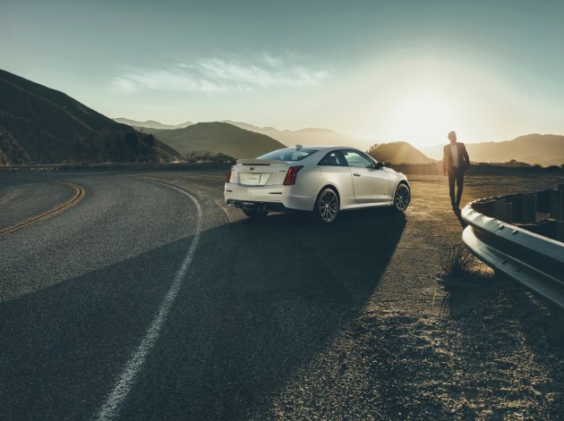 2016 Cadillac ATS-V parked in front of a sunset