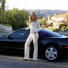 Marla Maples poses with a 1991 Acura NSX given to her by then-boyfriend Donald Trump