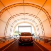 A tunnel at the new Active Safety Test Area allows engineers to simulate toll booths and other structures that require special attention when designing active safety technologies
