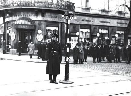 Life before traffic lights as a police officer directs traffic