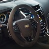 The interior of the 2016 Cadillac CTS-V features a leather-trimmed steering wheel