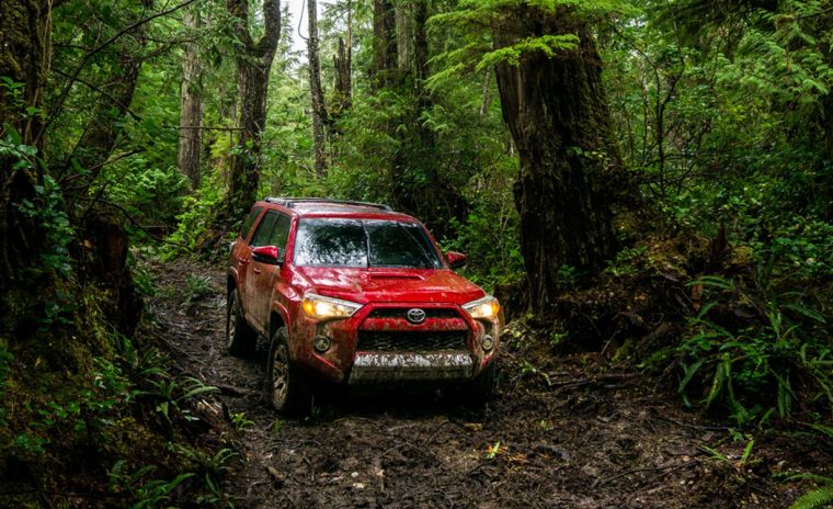 2016 Toyota 4Runner in the mud in the woods