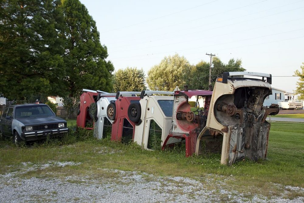 Cars buried in the ground on Route 66 at Henry's Rabbit Ranch in Staunton, Illinois