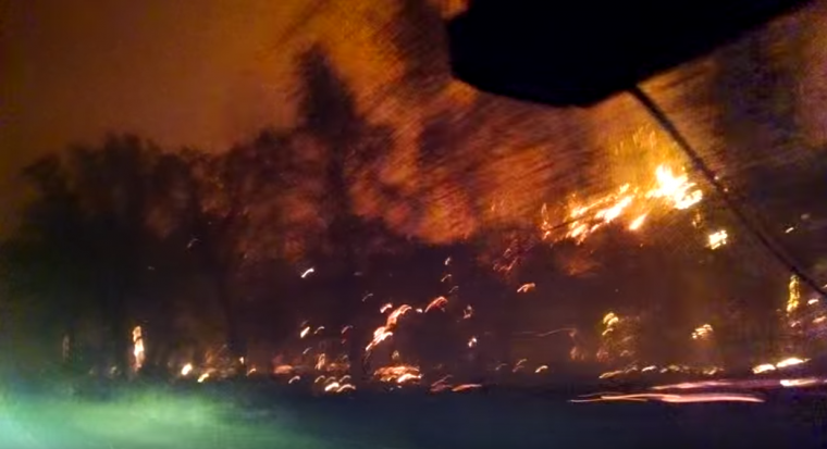 Northern California forest fire burning hillside