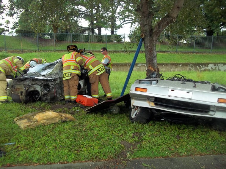 Pino's split Nissan with Fire Fighters