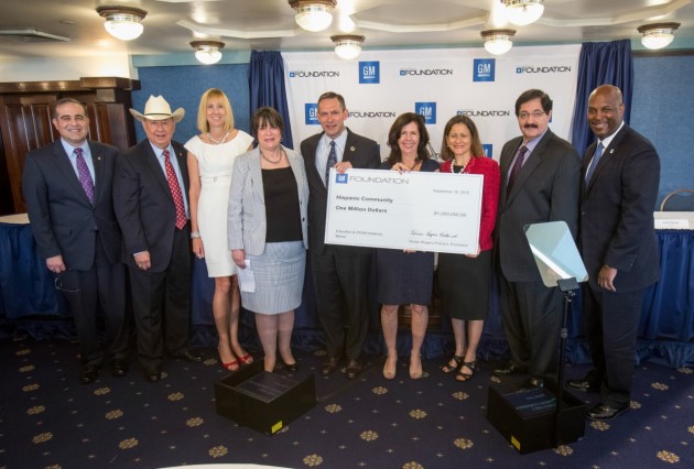 GM representatives present grant money totaling $1 million at the National Press Club