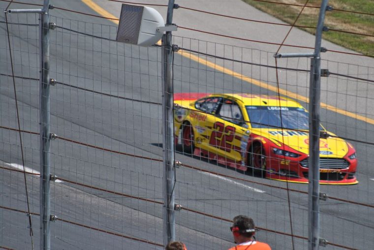 Joey Logano won Sunday's race at Kansas after spiing out Matt Kenseth who was leading with five laps to go. 