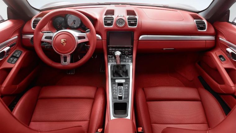 The 2016 Porsche Boxster features a 3-spoke steering wheel in leather with full-color Porsche crest