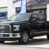 The 2016 Ford F-150 features a black three-bar style grille with black nostrils