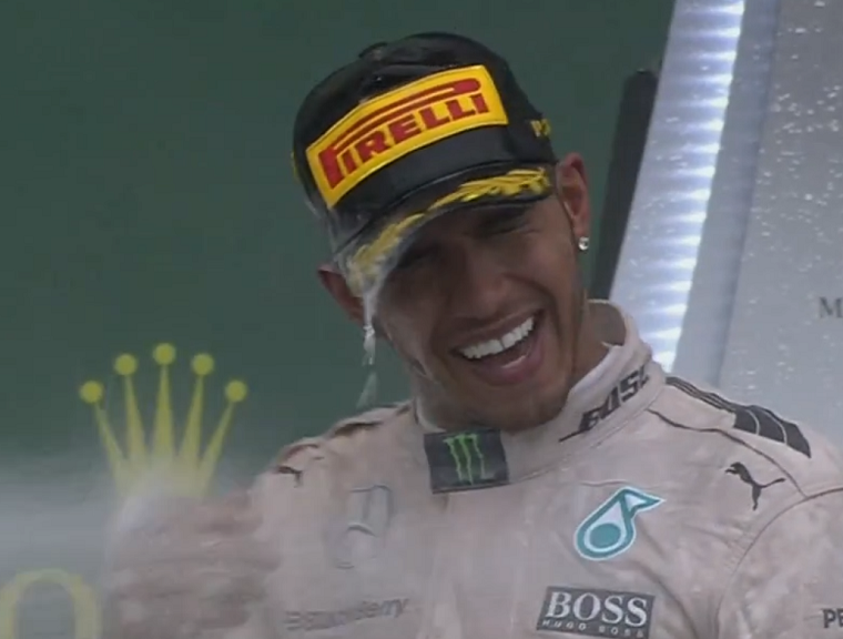 Hamilton sprayed with champagne