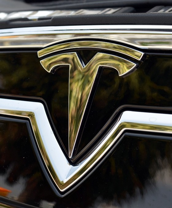 Behind the Badge: Does the Tesla Emblem Represent More Than the Letter