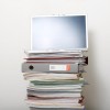 Stack of books and computer