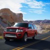 The 2016 Ford Expedition features a bright chrome grille with Magnetic painted inner accents