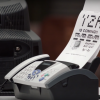 Fax machine in Chevy Volt ad mocking Toyota Prius