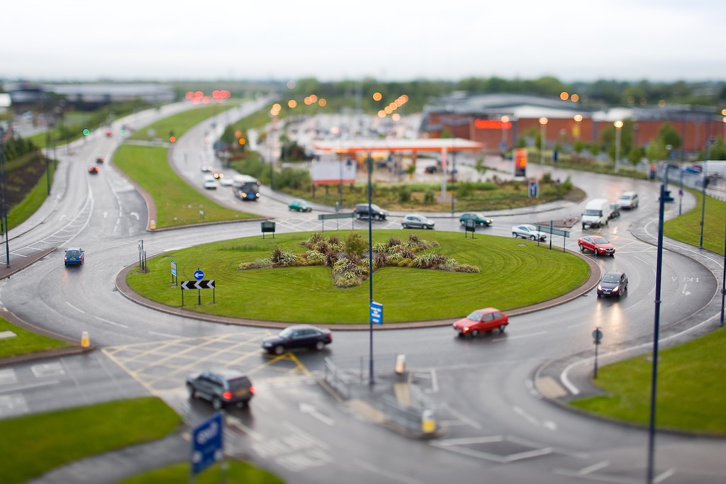 Roundabout circular traffic intersection driving island America