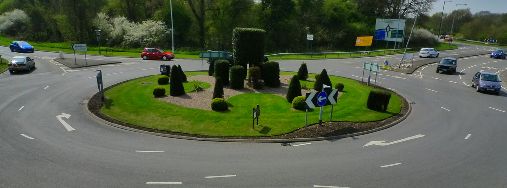 Roundabout circular traffic intersection driving island UK