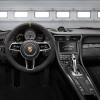 The 2016 Porsche 911 features a 911 logotype badge behind the gearshift lever