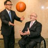 Toyota president Akio Toyoda shoots some hoops with International Paralympic Committee President Sir Philip Craven