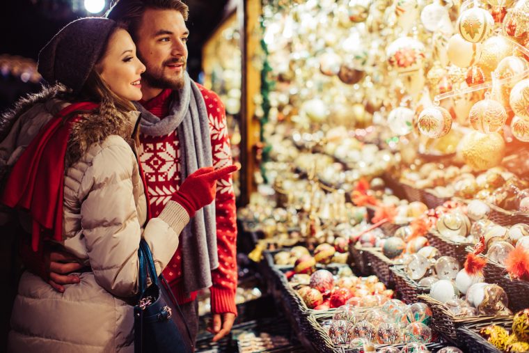 Couple shopping for Chirstmas holiday ornaments & stocking stuffers