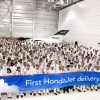 Honda Aircraft Company associates celebrate the first HondaJet delivery