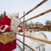 Santa Claus feeding reindeer for Christmas