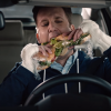 Daily Show correspondent Jordan Klepper double-fists hoagies in 2016 Honda Civic promo