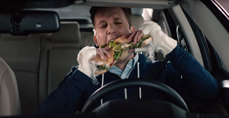 Daily Show correspondent Jordan Klepper double-fists hoagies in 2016 Honda Civic promo