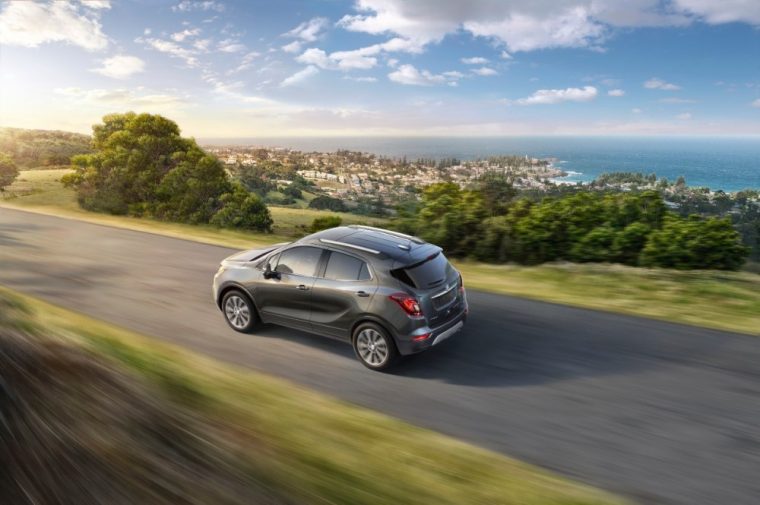 2017 Buick Encore driving down a street