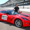 John Green poses with a 2016 Chevy Corvette Stingray Coupe pace car at Indianapolis Motor Speedway