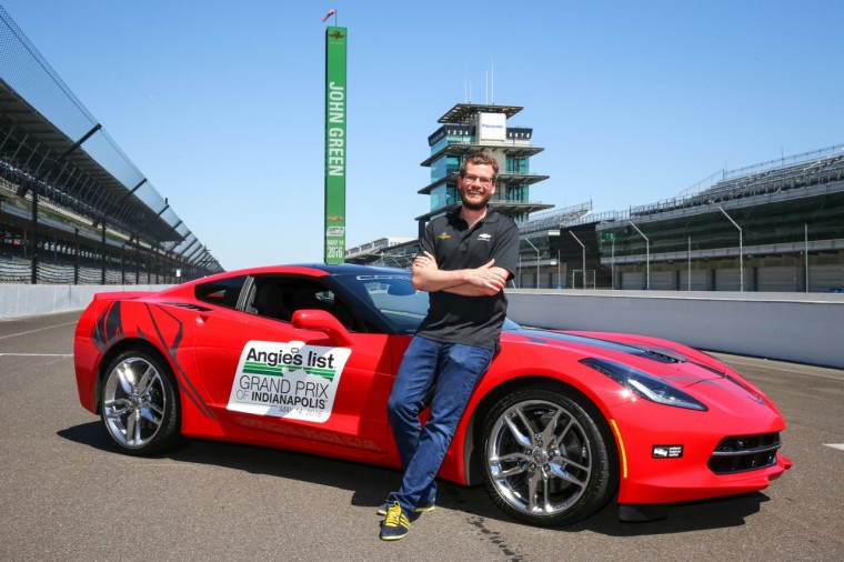 John Green poses with a 2016 Chevy Corvette Stingray Coupe pace car at Indianapolis Motor Speedway