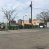 Woman eating chips at Sunoco station