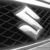 suzuki S logo emblem on grille