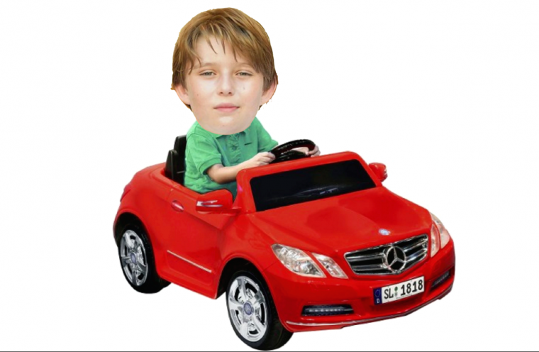 Donald Trump's ten-year-old son Barron Trump and his toy Mercedes