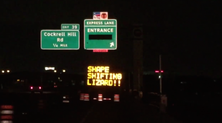 Sign in west Dallas, Texas warns motorist that "Donald Trump is a Shape-Shifting Lizard"