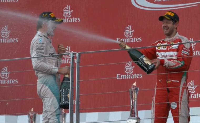 2016 European Grand Prix - Vettel Sprays Rosberg