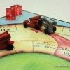 Allen's Dirt the Game board game review car pieces dice