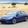 The 2017 Honda Accord Hybrid sedan yields EPA-estimated fuel economy of 49 mpg on the highway, but still comes with an affordable price tag