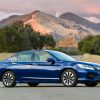 The 2017 Honda Accord Hybrid sedan yields EPA-estimated fuel economy of 49 mpg on the highway, but still comes with an affordable price tag