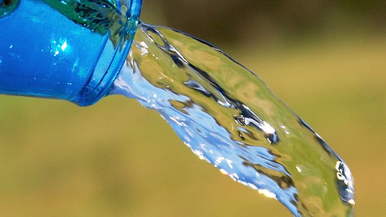 water bottle pouring drink