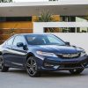 The 2017 Honda Accord Coupe offers the choice between a four-cylinder and V6 engine, as well as the option between a standard manual or available automatic transmission