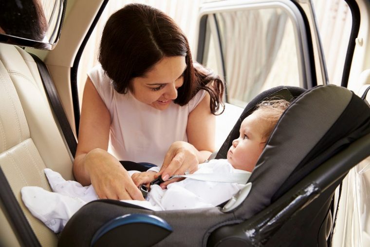 baby in car seat with mother baby names