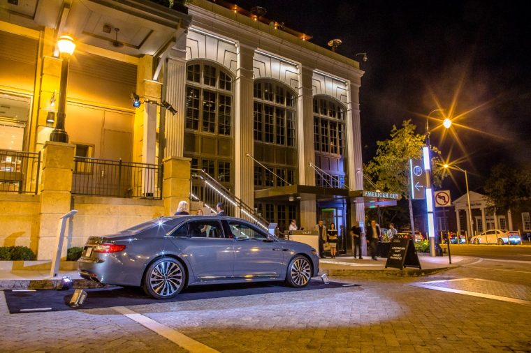 A 2017 Lincoln Continental parked outside of the Atlanta steakhouse American Cut