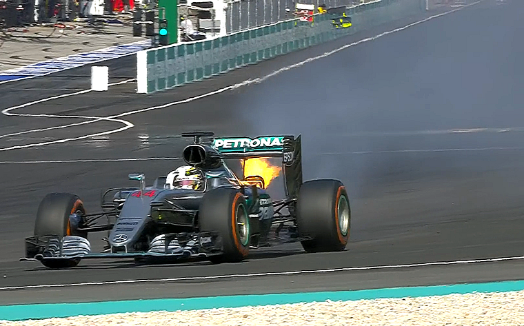 Hamilton's car catches on fire