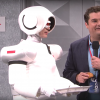 Bobby Moynihan and host Emily Blunt in the SNL skit "Honda Robotics"