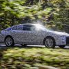 A camouflaged Opel Insignia Grand Sport is tested ahead of the 2017 Geneva Motor Show