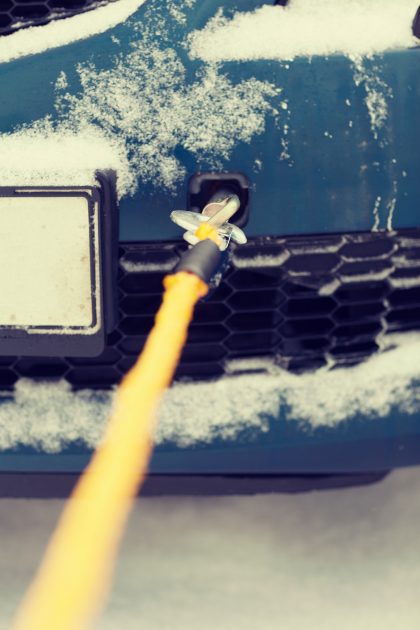 car being towed towing cable snow