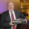 John Mendel, executive vice president of the Automobile Division of American Honda Motor Co., Inc., accepts the North American Truck of the Year award for the 2017 Honda Ridgeline on January 9, 2017 at the North American International Auto Show in Detroit.